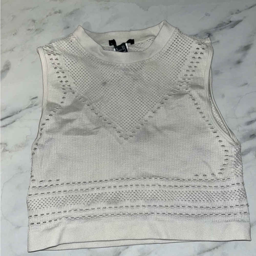 Knitted crop top with holes
